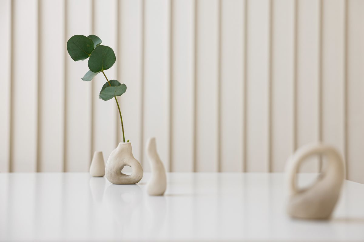 Ceramic vase and foliage