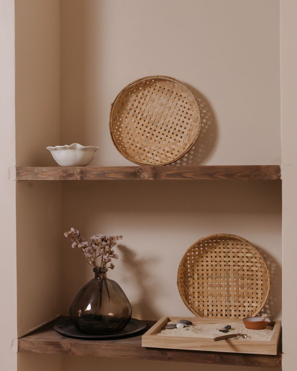 Ceramic vase and bowl on shelf